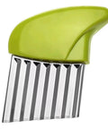 Green-handle stainless steel crinkle-cutting tool with a wavy blade for vegetables.