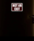 Two Pack Heavy Duty Aluminum Not Exit Signs Measuring Ten By Seven Inches on a dark door to indicate no exit