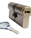 Door lock cylinder with brass shell and slide blade; 2-piece set with silver key blank for wooden or aluminum doors
