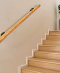 Rock Solid Pine Wood Stair Handrail With Legit Heavy Duty Metal Brackets And Smooth Rounded Corners For Reliable Indoor Wall Mount Support Carrying Groceries Or Packages No Sweat mounted on a wall.