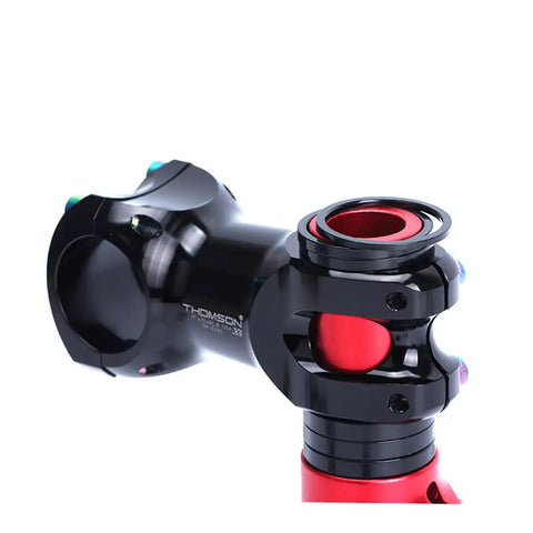 Fifteen Piece Aluminum Alloy Headset Spacers Set For 28.6mm Forks And Handlebars Black Anodized Includes 2mm 5mm And 10mm Spacers Perfect For Mountain And Road Bikes showing black anodized spacer installed on handlebar