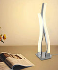 LED Table Lamp For Bedroom With Touch Dimmable Brightness And Memory Function Modern Arc Silver Desk Light lit on desk