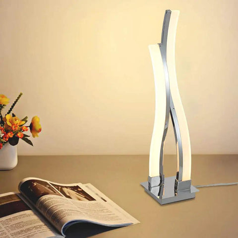LED Table Lamp For Bedroom With Touch Dimmable Brightness And Memory Function Modern Arc Silver Desk Light lit on desk