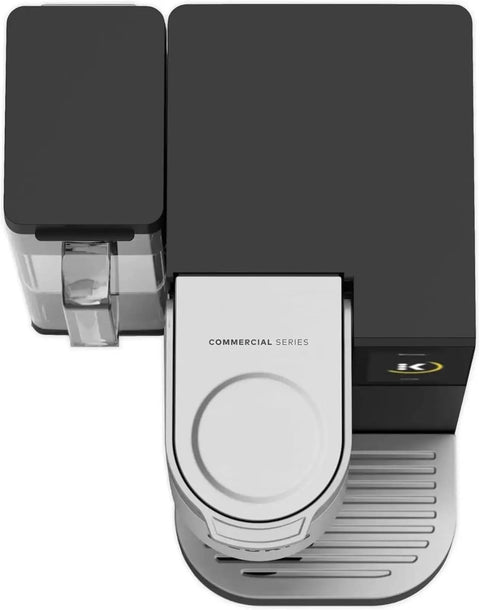 Top view of a Commercial Espresso Machine With Large Water Reservoir Delivers Freshly Brewed Coffee Tea And Hot Cocoa In About A Minute