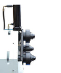 Close-up of Hardcore Hydraulic Roll Bender components with hydraulic cylinder and pipe rollers for precision metal fabrication.
