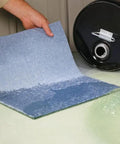 Using Blue Absorbent Mat Pad In Dispenser Box Heavy Duty Pack Of Fifty With 75 Percent Recycled Fibers Fire Retardant For Safety
