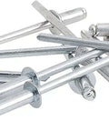 Pop Rivet Assortment Kit For Metal Fabric Leather And Auto Repair One Eighth Inch Rivets Aluminum And Steel scattered on white surface