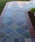 Pathway featuring slate tiles with brick borders, treated with Premium Dead Simple Water Based Non Slip Floor Sealer And Coating For Slippery Tiles And Concrete Easy Apply Exterior Interior Matte Finish Durable Grip Protection.