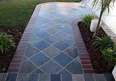 Pro Grade Water Based Non Slip Sealer For Slippery Floors applied on a slate pathway, enhancing grip and safety.