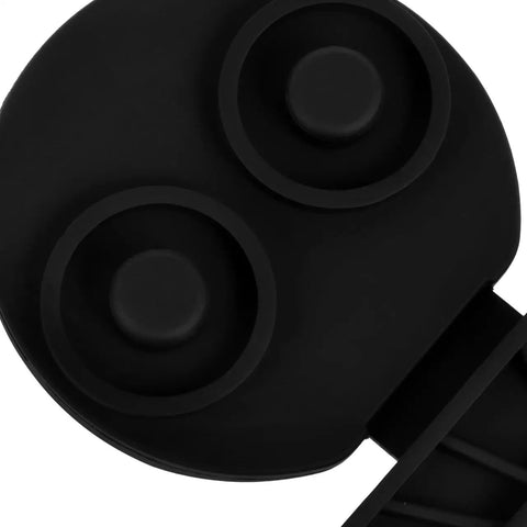 Close-up of Universal Silicone EV Charging Port Covers Two Pair, black, flexible design to shield ports from dirt.