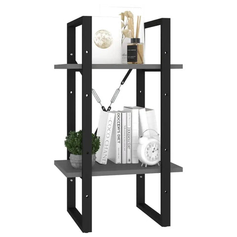 Front view of Two-Tier Gray Engineered Wood Book Cabinet For Home Office, 27.6 inches tall with books and decor on shelves.