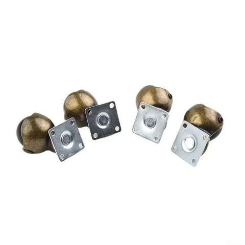 Four Pack Of 1.5 Inch Gold Ball Caster Wheels For Sofas And Ottomans Featuring Smooth 360 Degree Swivel Casters To Roll Furniture Around Home Without Breaking A Sweat Or Scratching Floors Ever - close-up of gold ball casters with mounting plates