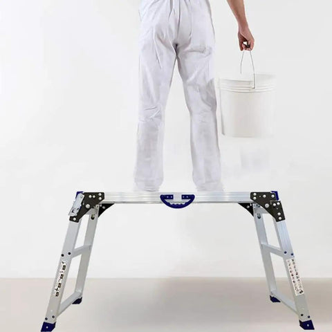 Person standing on All In One Work Platform 39 By 12 Inch, 50 Gear Height Adjustable Aluminum Step Ladder 25 To 35 Inches holding a bucket