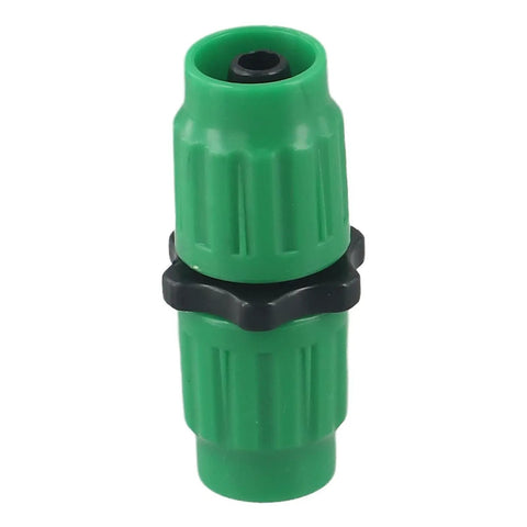 Grab This Expandable Garden Hose Repair Kit For All Your Leaks And Fittings, Featuring Tough Plastic Connectors That Fix 25 50 75 Or 100 Foot Hoses Perfectly With A Solid Build To Stop Drips And Restore Flow In No Time. Green plastic hose repair connector with black coupling ring on white background