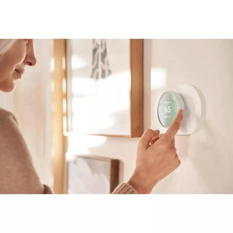 Person using Nest Thermostat with Thermostat Trim Kit For Nest Thermostat Easy Install Wall Plate Cover Snow Finish