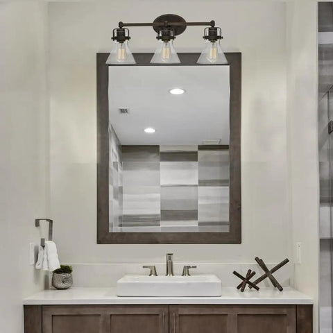 Seafarer 3 Light Bath Vanity Light In Oil Rubbed Bronze Steel Finish With Seeded Glass Shades over modern bathroom sink