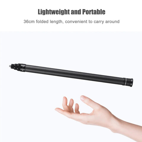 Carbon Fiber Selfie Stick With Telescopic Shaft Reaches Near Fifty Nine Inches For Killer Wide Shots and Smooth One Hand Control shown in folded 36cm length held in hand.
