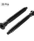Two black Heavy Duty Furniture Confirmat Wood Screws 7x69mm Hex Socket Self Tapping Connectors, powder coated, on white background.