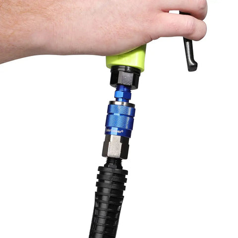 Hand using Blue 14 Piece Automotive Type C Coupler and Plug Kit With One Quarter Inch NPT Fittings Color Match System