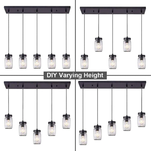 Five-Light Mason Jar Chandelier For Kitchen Island Farmhouse Linear Pendant Light Fixture With Matte Black Finish And Glass Shades For Dope Dining Room Lighting, shown with adjustable heights.