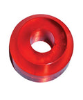 Close-up of a red bushing from the Bionic Quad Skate Bushings Set Medium Red For Inline Skates Pro Grade High Rebound Elastomer 8 Pack.