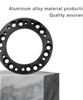 Heavy Duty 12mm Steering Wheel Hub Adapter And Wheel Spacer Blocks Built Tough From Corrosion Free Aluminum Alloy close-up view on cubed marble.
