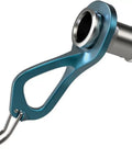 Close-up of blue 16cm Ice Screw Built To Shred with foldable stainless crank and teeth guard cap for ice climbing.