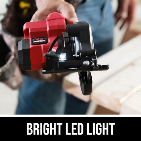 Super Compact One Handed Cordless Circular Saw Kit With Four And A Half Inch Blade Brushless Motor 20V Lithium Battery and Charger shown with bright LED light.