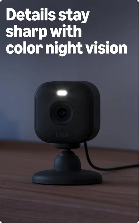 Hella Crisp Two Pack Indoor Security Cameras Running Smooth With 2K Video Resolution compact black camera on desk with night vision