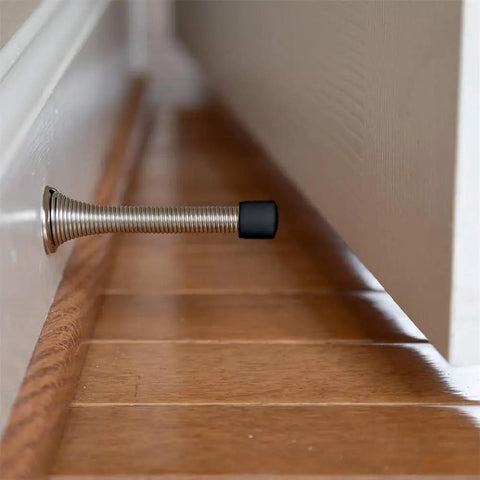Premium Rubber Door Stop Tip Replacement Set 16 Pcs Door Stopper Bumpers And Spring End Caps installed on wall protecting door