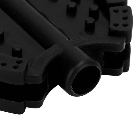 Close-up of Two Piece Plastic Kids Pedals Set For Tricycles and Bikes, black durable non-slip pedal detail