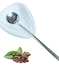 Ceramic Spoon Rest and Stainless Steel Stirrer Holder for Coffee and Tea Spoons with coffee beans and leaves