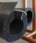 Rock Solid Premium Pipe Insulation Self Sealing Foam Rubber Tube close-up showing flexible black insulation for copper and PEX pipes.
