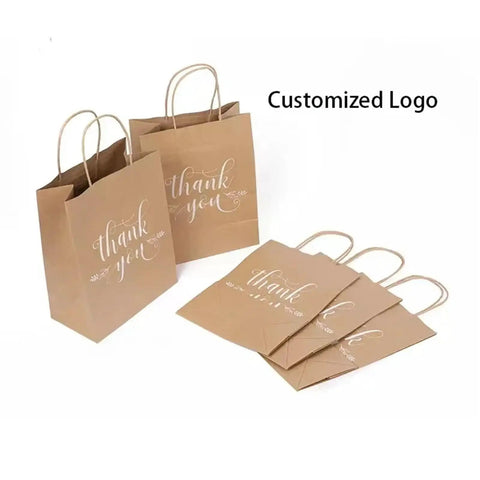 Customized kraft paper bags with handles, 'thank you' design visible, suitable for takeout and shopping.