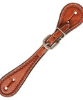 Close-up of tooled edge spur straps for ladies with white accent stitching, leather strap and stainless steel buckle for horseback riding.