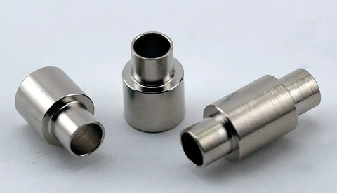 Three metal bushings from 3-Piece Bushing Set For Slimline Pro Pen And Pencil Woodturning Kits displayed on a light background.