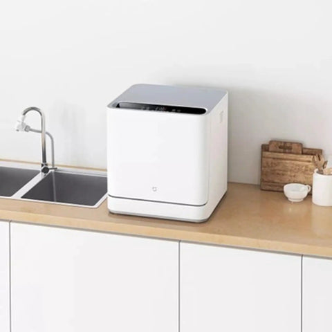 No Hookup Countertop Dishwasher That Sets Up In Minutes And Cranks Out Immaculate Loads Daily while placed on a kitchen countertop.