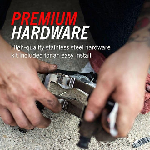 PowerStop front brake pads with stainless steel installation hardware; hands installing.