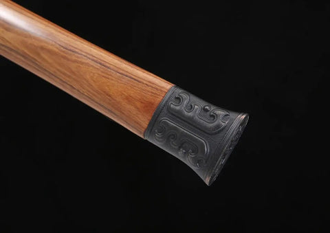 Close-up of rosewood handle with kirsite fitting on Hand-Forged Damascus Han Sword With 42-Inch Battle-Ready Chinese Longquan Blade.