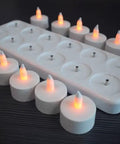 Rechargeable LED Tea Lights Set Of 12 With Flameless Flicker In Amber Color Includes Frosted Holders Charge Base Power Adapter And User Manual