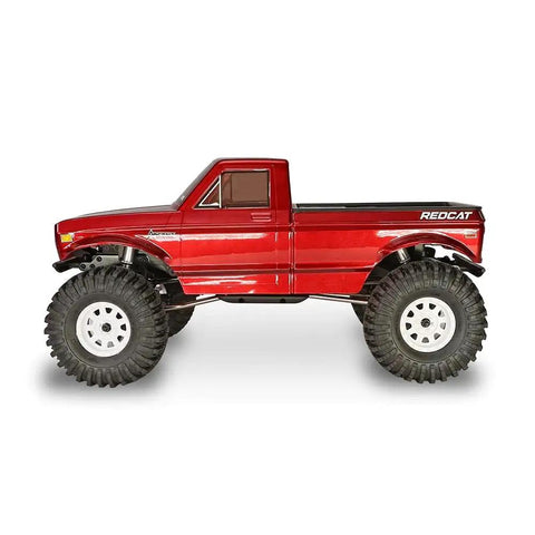 Side view of 1/10 Scale Rock Crawler With High Torque 4WD Portal Axles, red body, off road tires, ready to run RC trail truck.