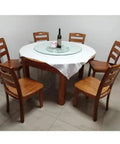 Tempered Glass Turntable With Six Wheel Stabilizers Heavy Duty Rotating Serving Plate on a dining table with chairs