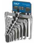 Heavy Duty Bearing Puller Set With Self Locking Arms For External And Internal Pulls, displayed with various jaw sizes.