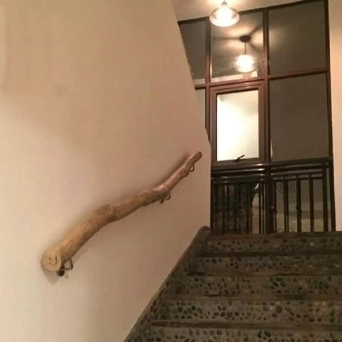Top Shelf Pine Wood Handrail Kit Adjustable From One Foot To Twenty Feet No Slip Stair Railing mounted on wall beside stairs.