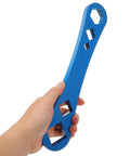 Heavy Duty Oil Drain Screw Removal Tool And 30mm Hexagonal Socket Wrench For Cars held in hand for easy oil filter changes.