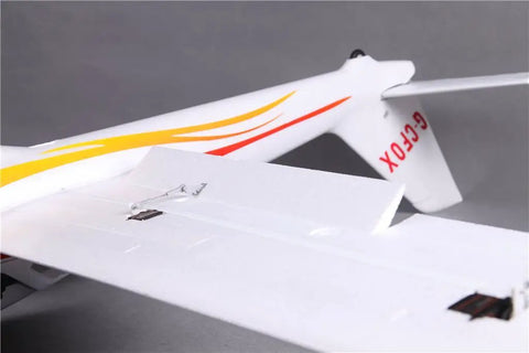 Close-up of Fox Glider V2 RC Airplane With Flaps 91.4 Inch Wingspan tail section showing flaps and foam construction.