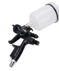 Pro Grade HVLP Paint Sprayer Gun with 600 milliliter cup and 1.3 millimeter tip for smooth finishes on wood and walls.