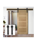 Top Tier Carbon Steel Barn Door Hardware Kit Heavy Duty Sliding Track System Rock Solid Matte Black Rail Smooth Glide For One Door Easy Install in a modern home interior with wooden door.