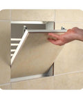 Heavy Duty Touch Latch Tile Access Door For Walls Featuring Seamless Concealed Design open panel being accessed, durable aluminum, 12X12 inches.