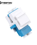 Close-up of a blue and white LC duplex singlemode keystone jack coupler for fiber wall plate connector, LC to LC cable adapter.